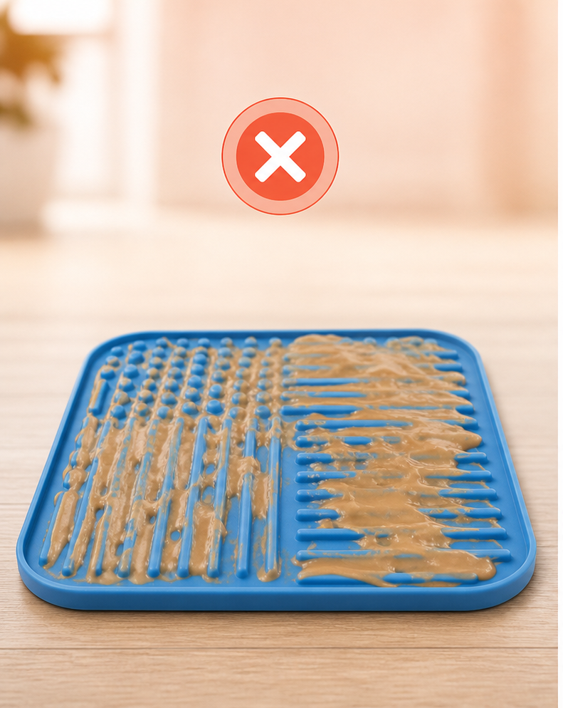 Lick mat with peanut butter smeared across an open surface